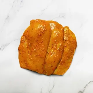 Marinated Halal Chicken Breast Burger Slices - per lb — 1kg